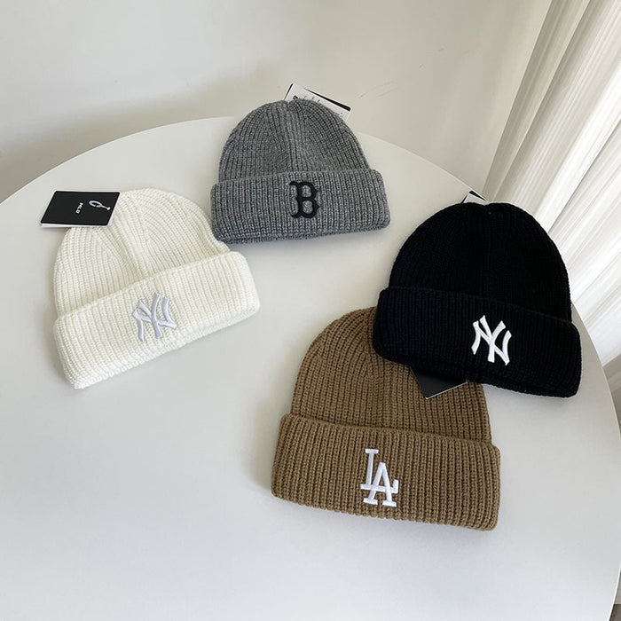 Wholesale autumn and winter cold-proof warm letter embroidered knitted hat ear protection hat JDC-HT-MaiM001