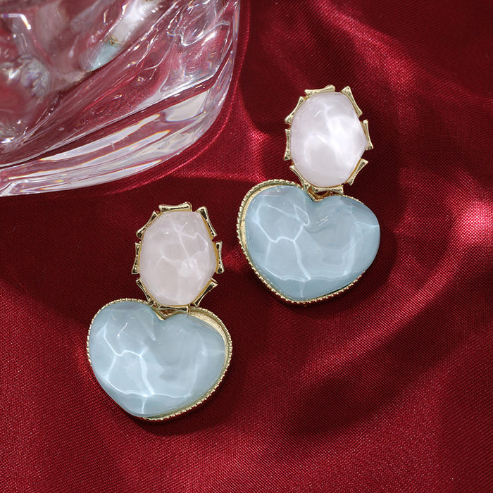 Wholesale Blue contrasting water ripple heart design earrings