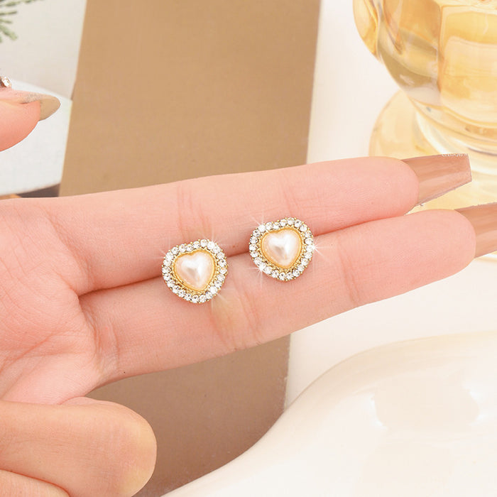 Wholesale Silver needle heart-shaped pearl earrings, light luxury earrings, retro temperament, niche design sense