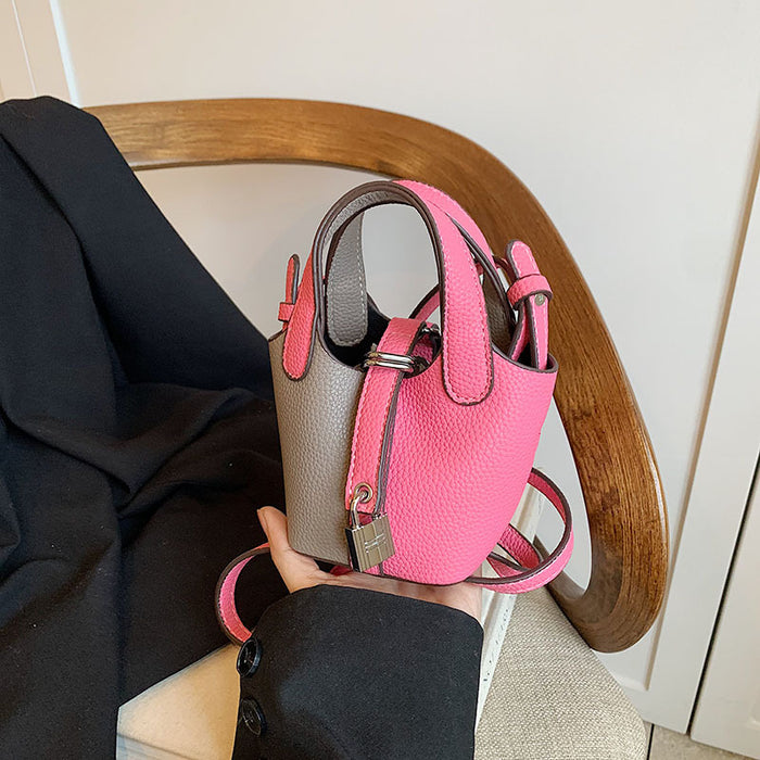 Wholesale Children's bag, high-end color blocked mini bucket bag, hand-held bucket bag, crossbody bag