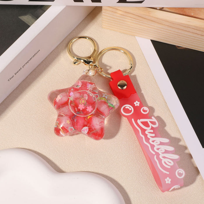 Wholesale five-pointed star flower quicksand bottle creative colorful cartoon bag key chain jewelry small pendant ornaments color