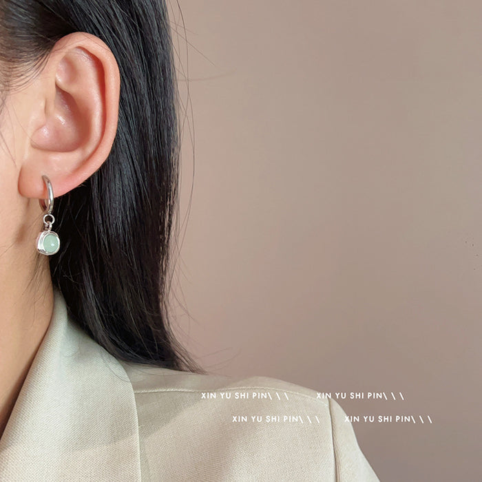 Wholesale Retro mint green cat eye stone pendant earrings with light luxury and high-end feel, exquisite and simple earrings