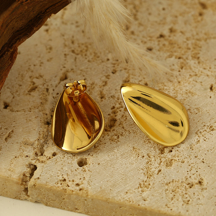 Wholesale Fashionable irregular concave gold water droplet earrings, niche high-end temperament, titanium steel non fading ear accessories