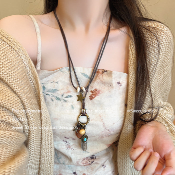 Wholesale Vintage feather necklace, double-layer layered long sweater chain accessory