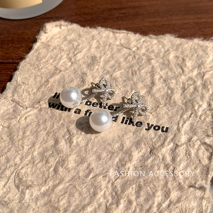 Wholesale Butterfly knot imitation pearl tassel earrings, light luxury temperament, earrings, earrings, studs, earrings