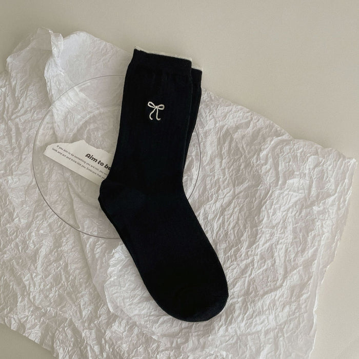 Wholesale Color blocked embroidery bow pile socks