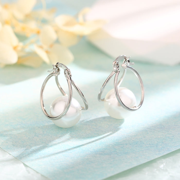 Wholesale Double layer pearl earrings with retro and simple commuting design, double circle pearl earrings