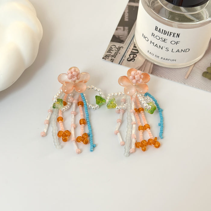Wholesale Romantic Flower Earrings with tassels, no ear holes, ear clips