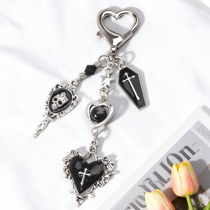 Wholesale Y2K Dark Style Cross Raccoon Butterfly Arrow Through Heart Keychain Pendant Zinc Alloy Boutique Resale Accessory