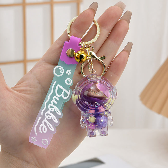 Wholesale Acrylic oil bottle candy Bean astronaut keychain