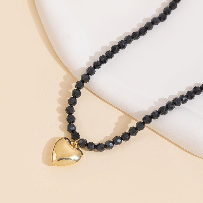 Wholesale Hot selling metal heart pendant necklace with geometric cut, personalized and fashionable peach heart necklace