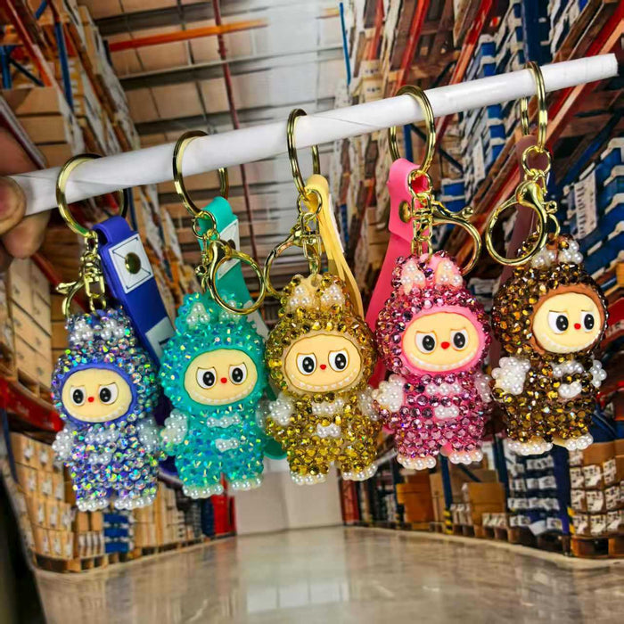 Wholesale Cute cross-dressing sitting pose backpack  keychain