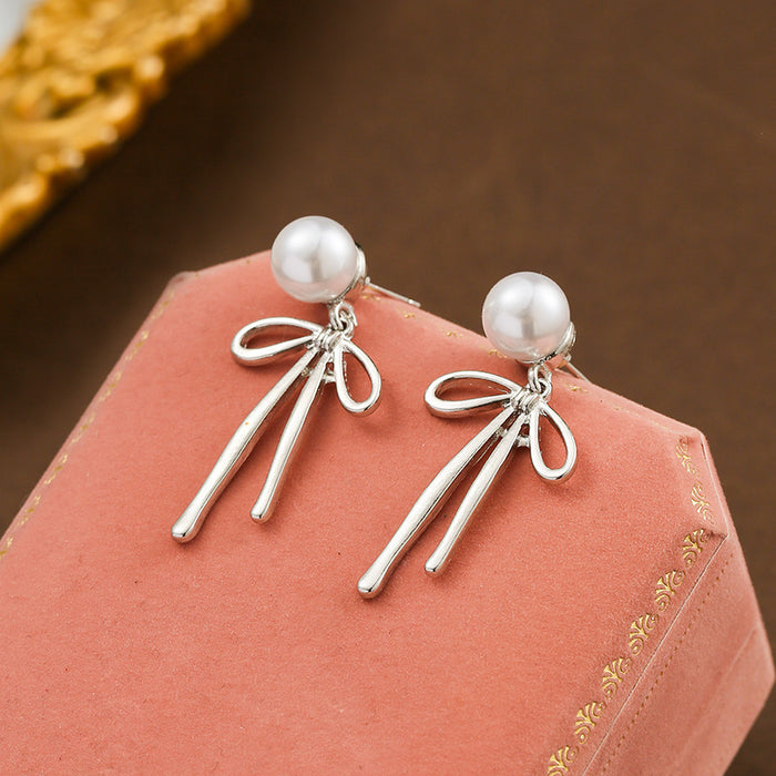 Wholesale Pearl earrings, light luxury, simple bow design, niche design, high-end accessories wholesale