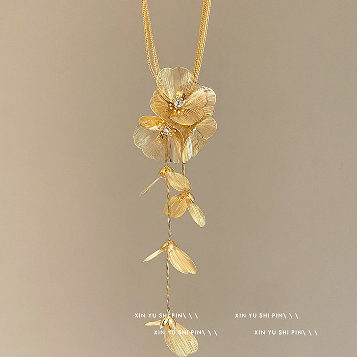 Wholesale Light luxury temperament, multi-layered hollow flower tassel necklace, retro niche personality, exaggerated collarbone chain