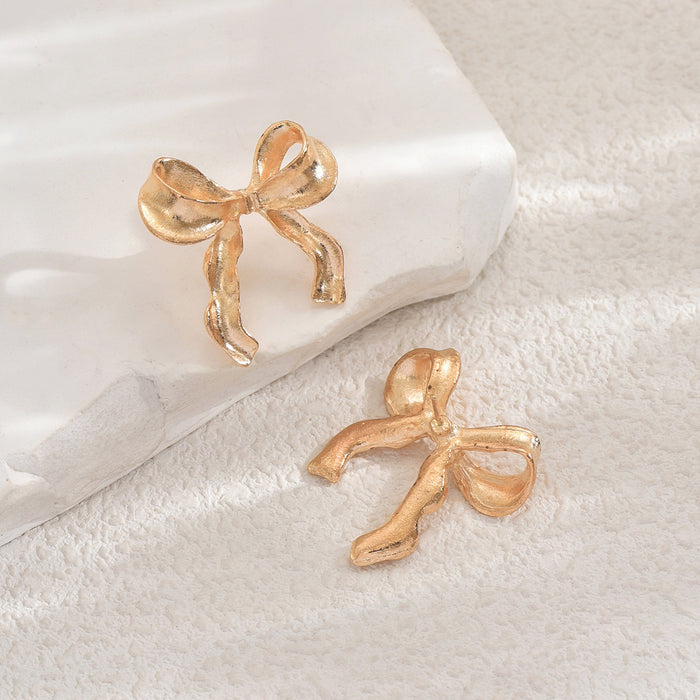 Wholesale Bow metal earrings for daily commuting, versatile earrings, simple and fashionable, smooth and elegant earrings