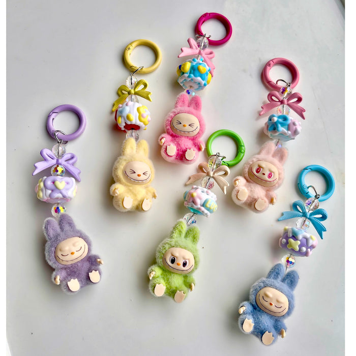Wholesale Flocked Mini Keychain Vinyl Cute Baby Walking Bag Mobile Phone Pendant Cute Pendant