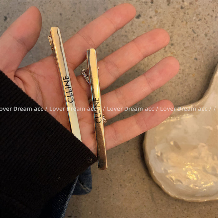 Wholesale Metallic style letter shaped hair clip with fashionable side bangs and ponytail accessories