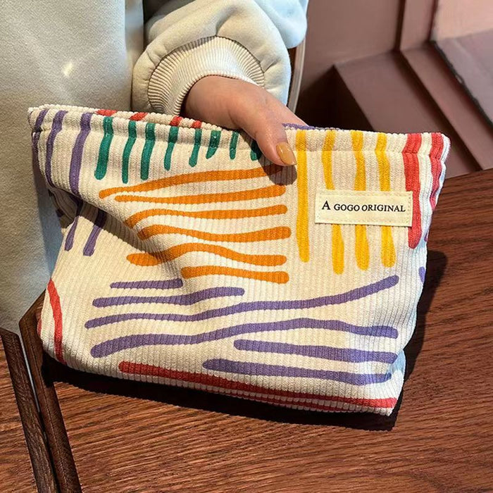 Wholesale Corduroy contrasting striped makeup bag for portable travel and business trips