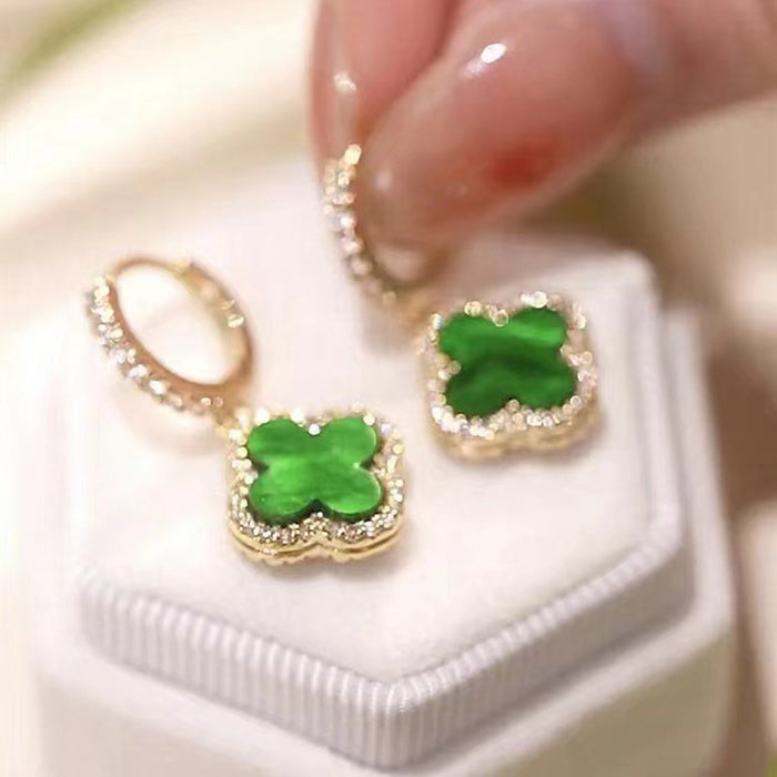 Wholesale Four leaf clover earrings, women's high-end classic earrings, copper gold-plated light luxury sparkling diamond zircon earrings