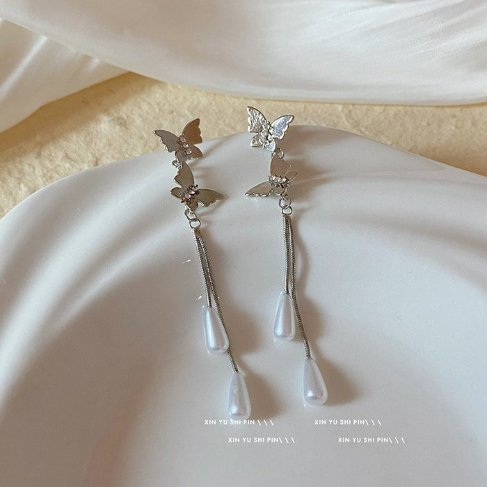Wholesale Vintage metallic floral tassel earrings with a light luxury and high-end feel, niche design temperament, versatile and long earrings