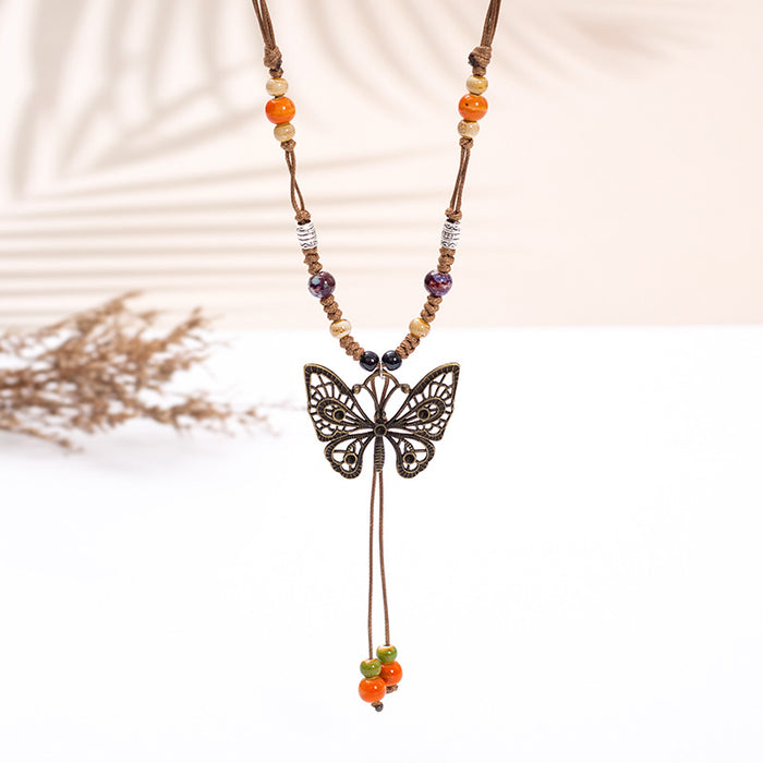Wholesale Long sweater chain women's pendant retro butterfly necklace