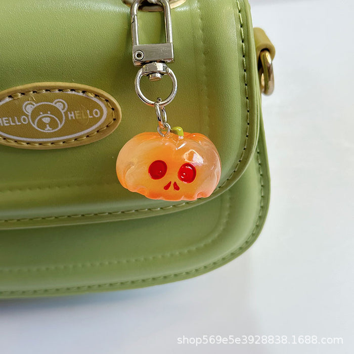 Wholesale Novelty  Pumpkin Pendant Keychain Glow In The Dark Resin Black Hat Design Bag And Earphone Case Charm Gift For Students And Couples