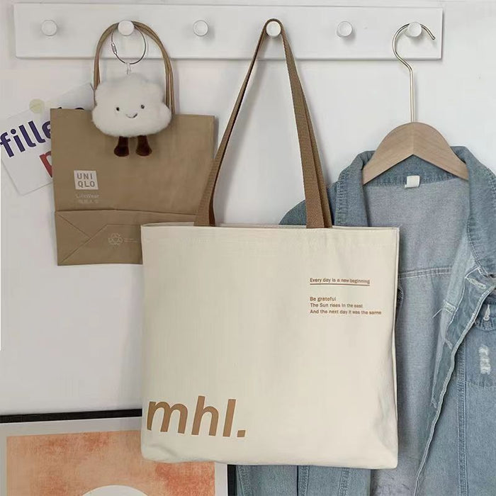 Wholesale New canvas bag, niche letter printed shoulder bag, large capacity commuting tote bag