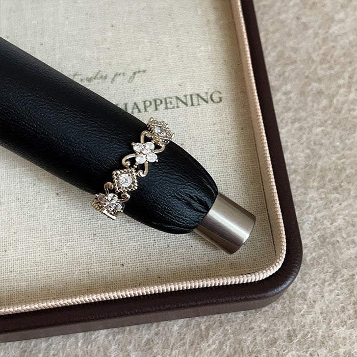 Wholesale Cross-shaped flower zircon brown gold ring