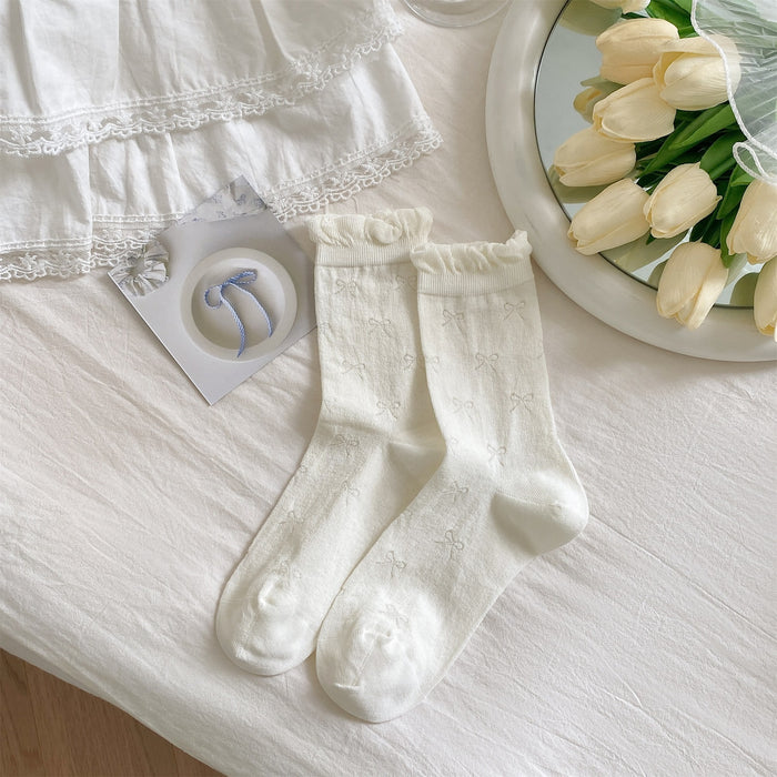 Wholesale Color blocked bow socks, boneless lace pile socks, mesh eyelets, tube socks