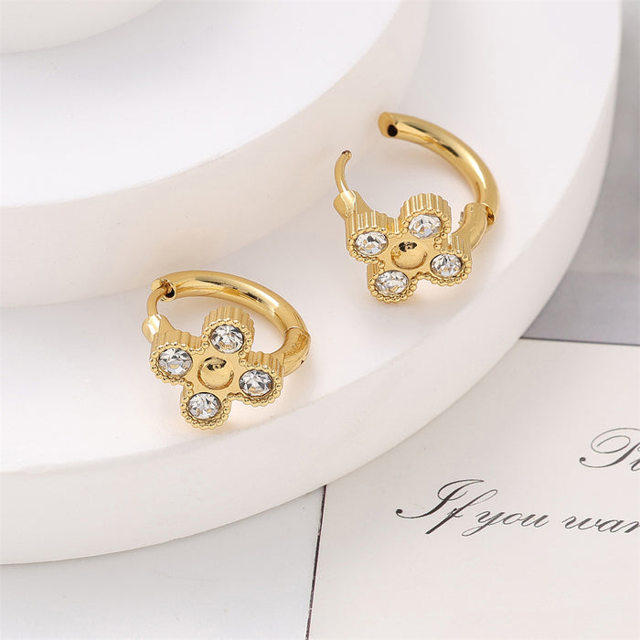Wholesale Titanium steel diamond studded clover earrings with light luxury design and fashionable ear buckle