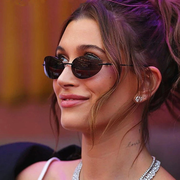 Wholesale Frameless oval sunglasses, new sunglasses with UV protection