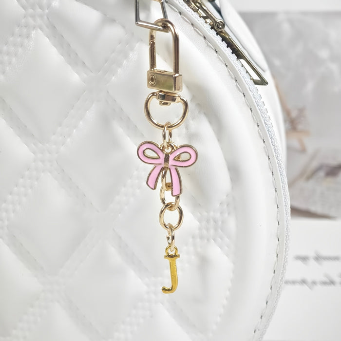 Wholesale Pink bow A-Z keychain alloy accessory