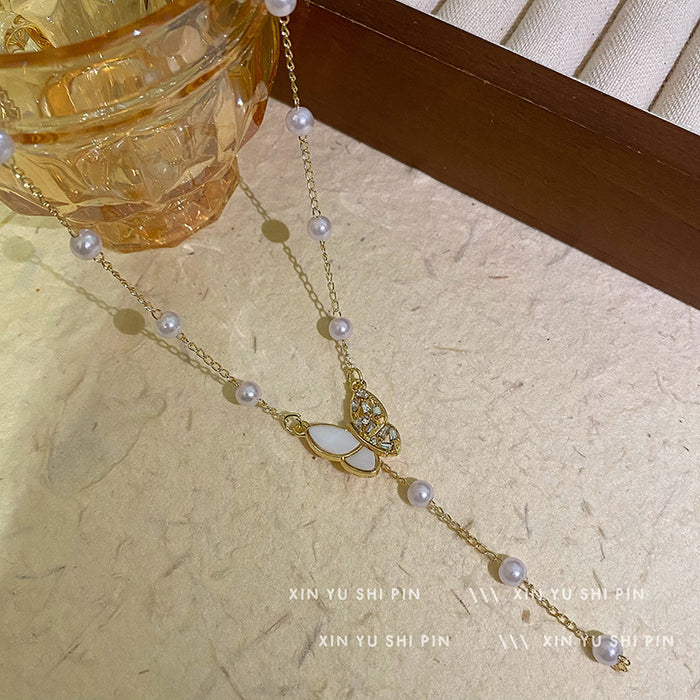 Wholesale Butterfly tassel pearl necklace, light luxury, high-end feeling, collarbone chain, new necklace