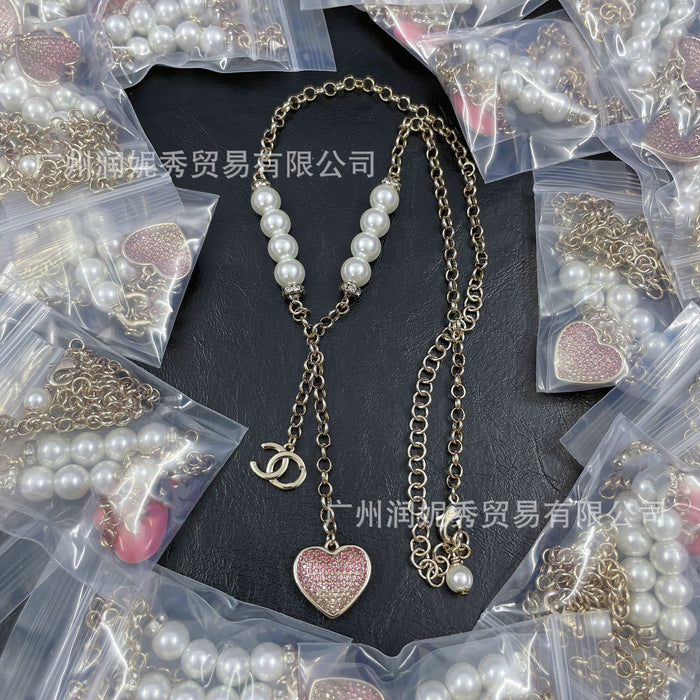 Wholesale Gradient tassel heart-shaped pearl necklace, pink diamond heart-shaped collarbone chain