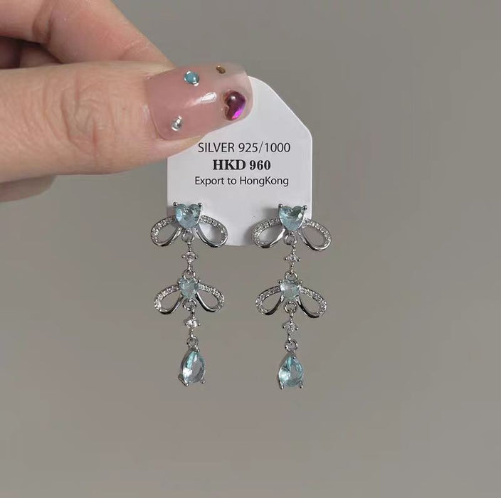Wholesale Blue heart-shaped zircon bow earrings, niche design, exaggerated earrings, high-end water droplet pendant, long earrings