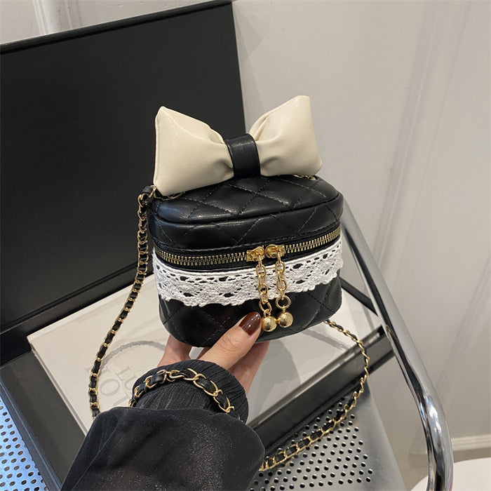 Wholesale Children's bag bow bucket bag cute contrasting color girl chain crossbody bag