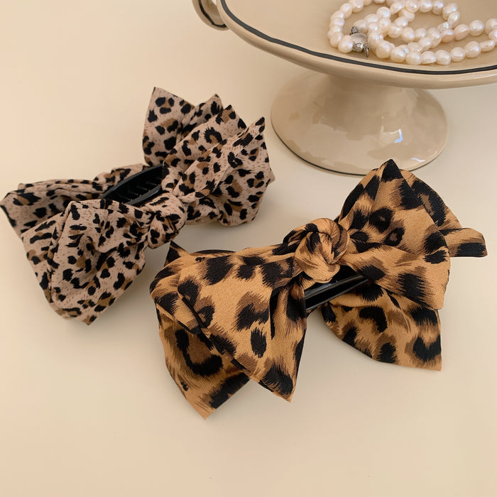 Wholesale Leopard print bow ball head clip female retro high ponytail fixed hairpin back of the head hair shark clip