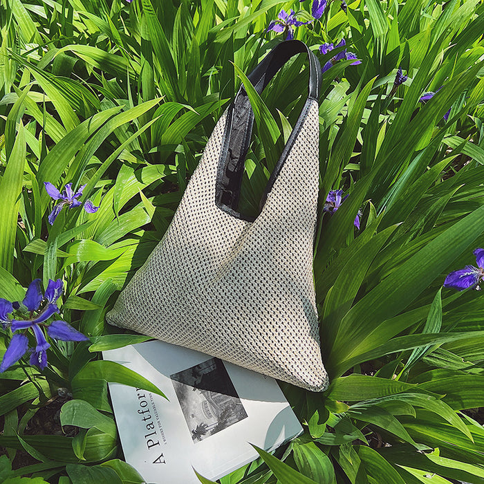 Wholesale New straw woven bag, fashionable and simple hollow shoulder bag, vacation and western-style beach bag, grass woven