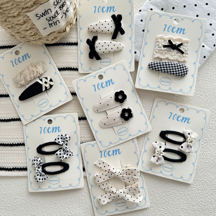 Wholesale Sweet bow hair clip with water droplets, wavy dots, children's fabric, side broken hair, wavy dots, bangs clip