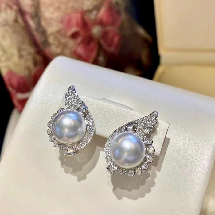 Wholesale Specially designed for niche angel wings, light luxury pearl earrings accessories, high-end pearl earrings