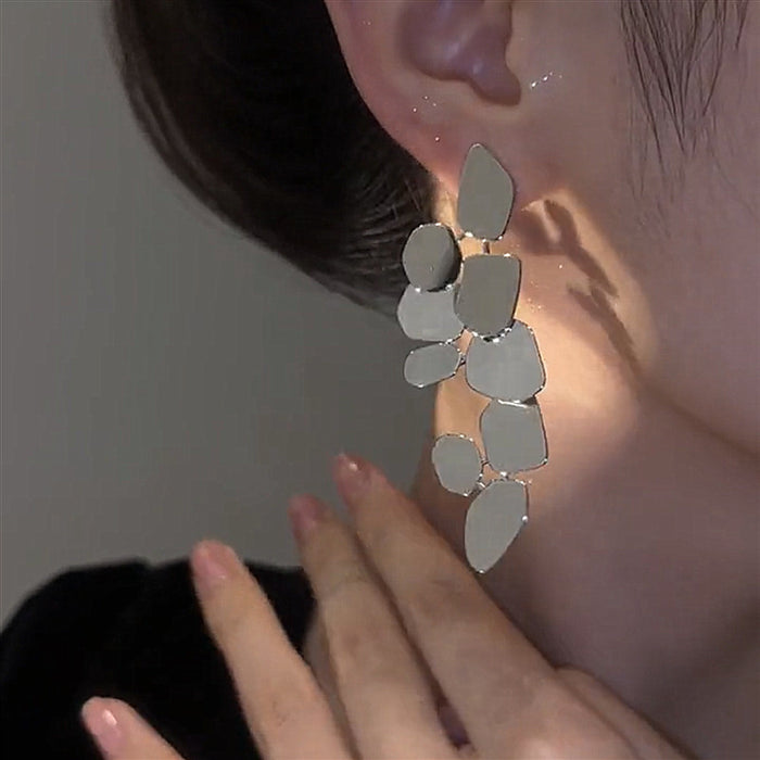 Wholesale Alloy exaggerated fashionable simple irregular leaf earrings for women