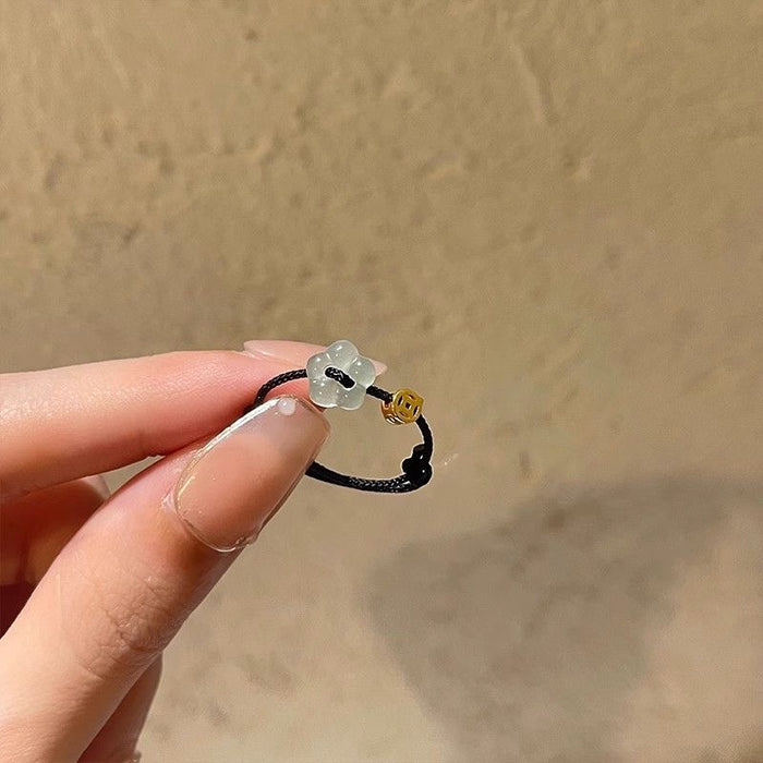 Wholesale Simple and versatile flower coin woven ring, niche design, unique adjustable ring
