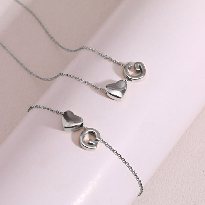 Wholesale Clavicle chain jewelry accessory 26 letter heart pendant titanium steel necklace