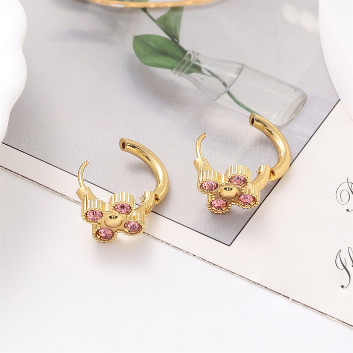 Wholesale Titanium steel diamond studded clover earrings with light luxury design and fashionable ear buckle