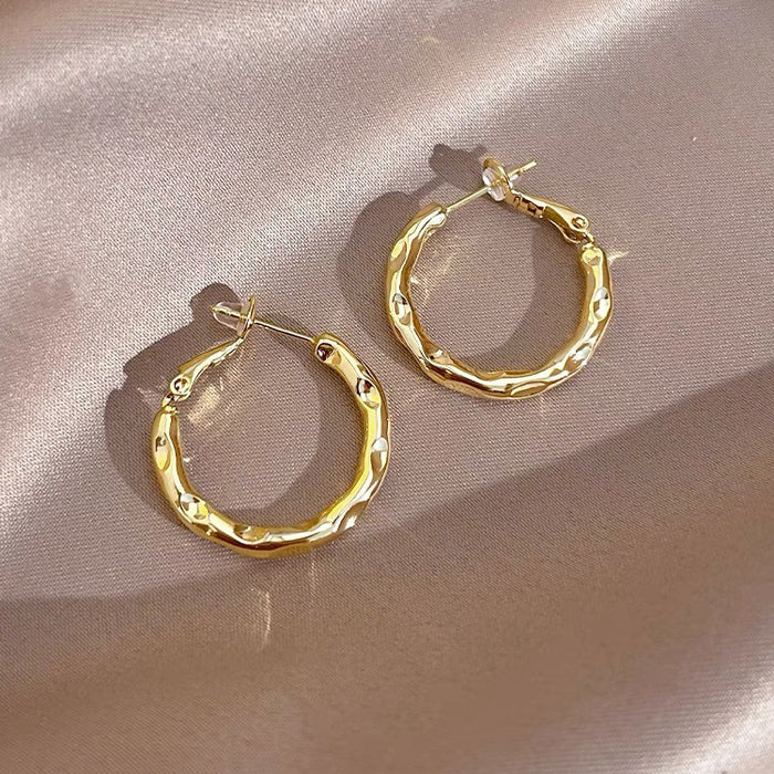 Wholesale Gold ring earrings with a high-end feel, niche pure silver earrings, temperament, and circle earrings