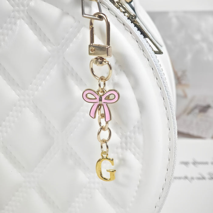 Wholesale Pink bow A-Z keychain alloy accessory