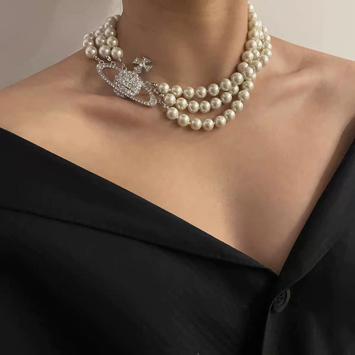 Wholesale Saturn-set diamond three-strand pearl necklace