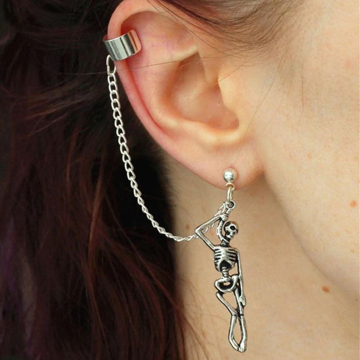 Wholesale alloy skull earrings trendy asymmetric chain ear clip Halloween couple jewelry