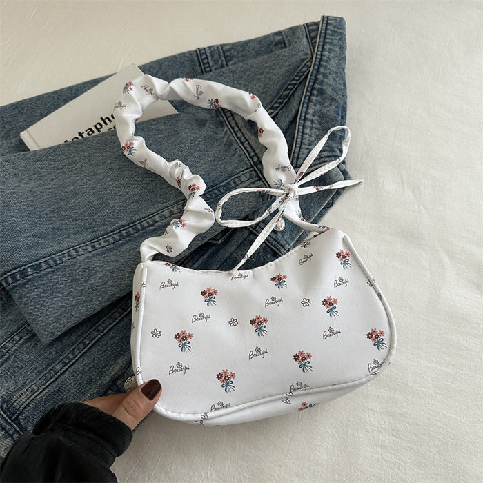 Wholesale Versatile pleated handbag, fashionable flower shoulder bag