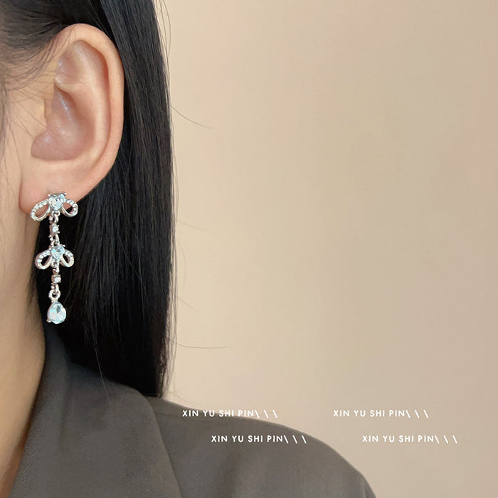 Wholesale Blue heart-shaped zircon bow earrings, niche design, exaggerated earrings, high-end water droplet pendant, long earrings